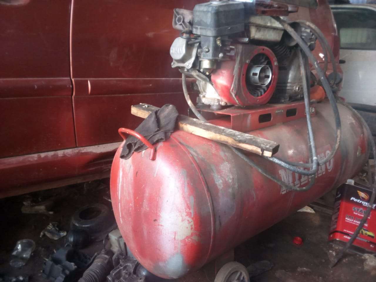 specialist garage in kenya showcasing their air compressor machinery
